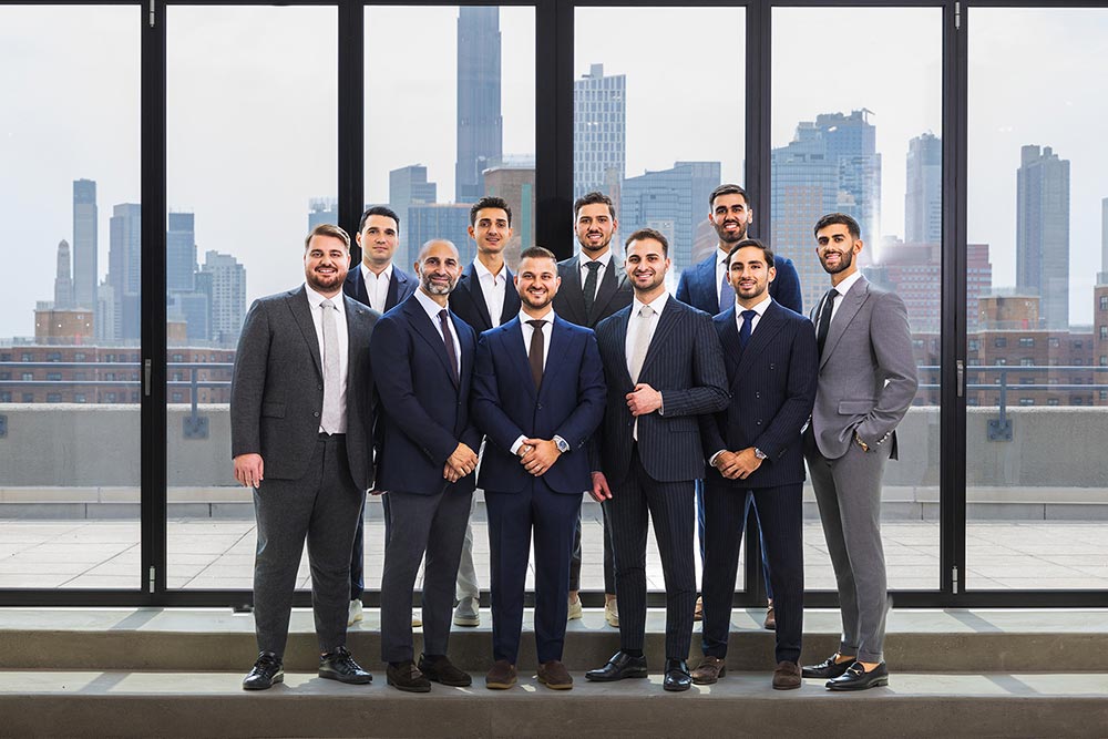 The Momentum Realty Group team looking over a panoramic view of the New York City skyline, representing their expertise in the market.